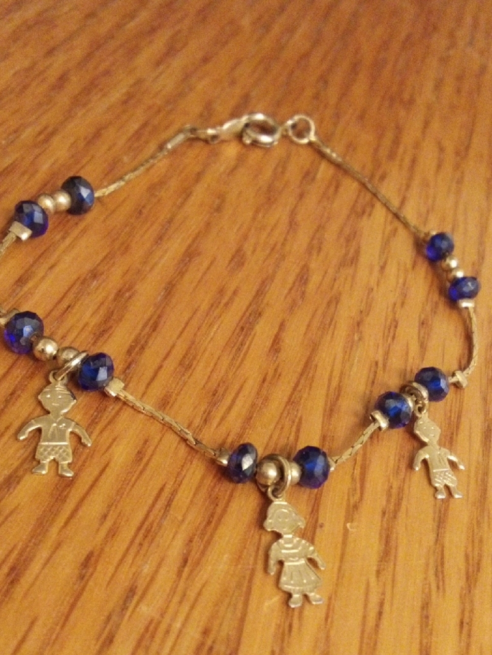 Silver Child Charm Bracelet with Blue Beads